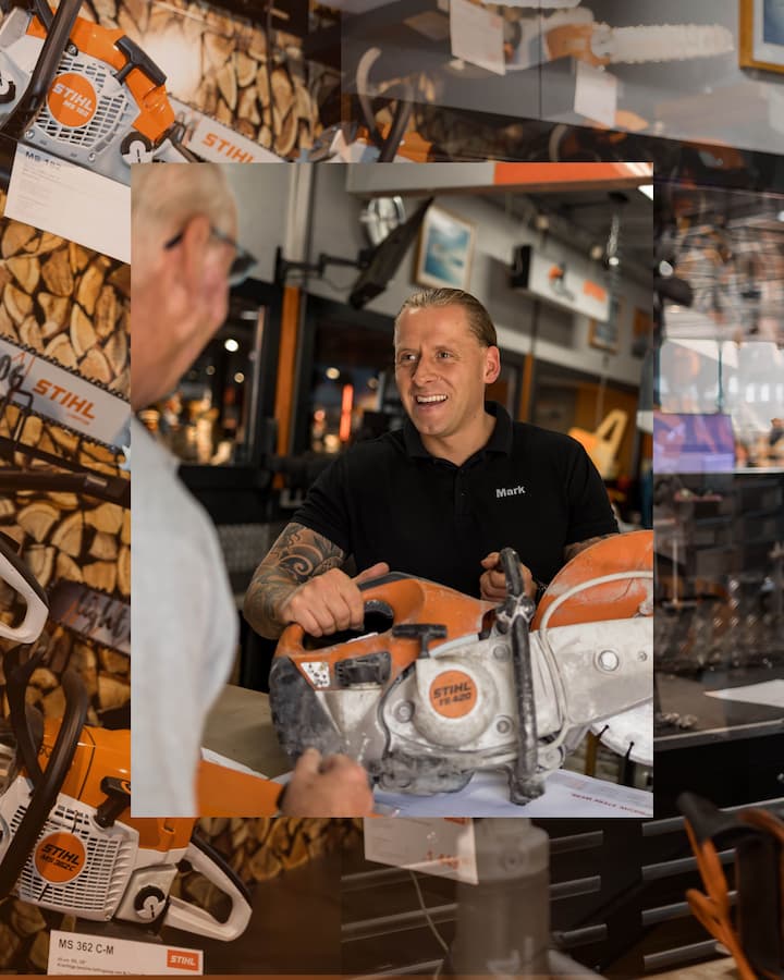 edrijfsfotografie van Van Den Berk Tuinmachines met teamfoto in de winkel.